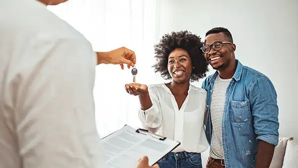 Couple getting house keys