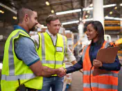 Workers shaking hands